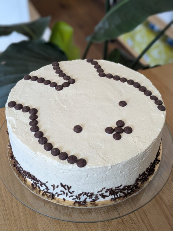 Vanilla cake with vanilla cream and chocolate mousse filling with a topping of Nijntje