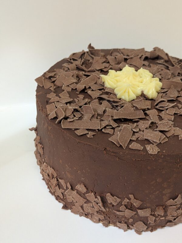 Chocolate cake with chocolate mousse and passion fruit ganache filling