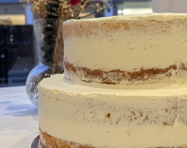 image of a two story vanilla cake with vanilla cream
